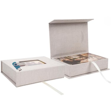 Linen photography presentation box with USB flash drive and photo prints.