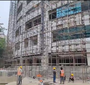 Steel framework installation in hospital building.