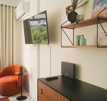 a television screen with a television and a chair