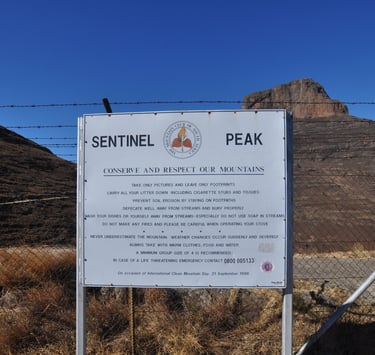 Sentinel peak car park sign, Drakensberg amphitheatre, South Africa 