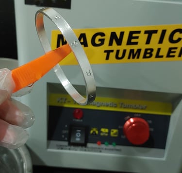 Close-up of silver surface finishing showing refined texture and detail.