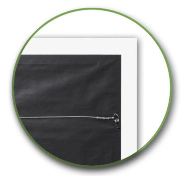 Back view of gallery wrapped canvas in a float frame with dust cover backing