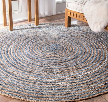 a round rug rug rug with a blue and white rug