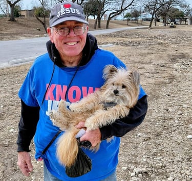 Christian brother Dean Gragg with his dog named Gizmo.