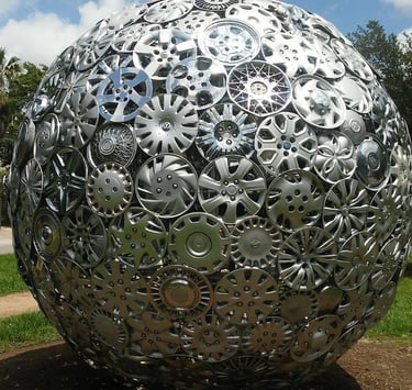Globe made out of recycled hubcaps