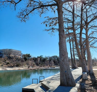 Guadalupe River Kerrville Texas with trees and dam in background