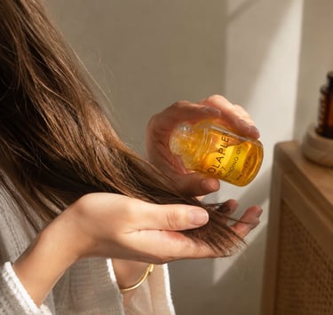 Glossy hair oil for smooth frizz-free healthy hair