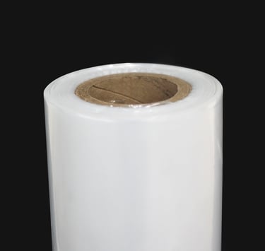 Detalhe da bobina seladora em fundo preto