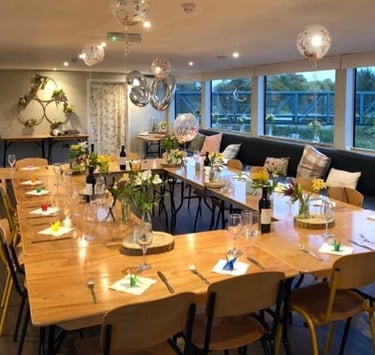 room set up for a birthday dinner on board the ark northampton