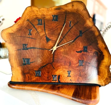 Edged wooden slab clock for table or shelf.