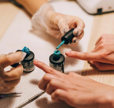 a woman is doing a manicure at Crows Nest