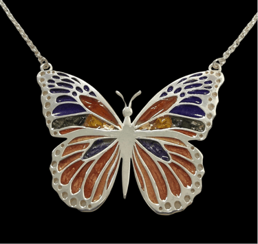 colgante mariposa y esmalte