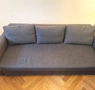 zasikana przez kotka kanapa po usunięciu plamy odkurzaczem piorącym