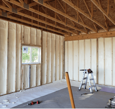 spray foam insulation inside of a house in lakewood, colorado