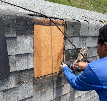 company working on a roof patch Des moines