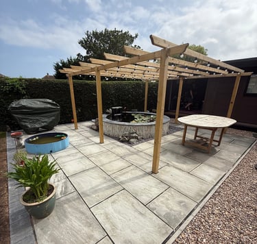 round raised pond paving & pergola garden ponds