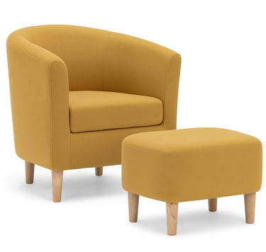 a mustard yellow chair and ottoman in a room