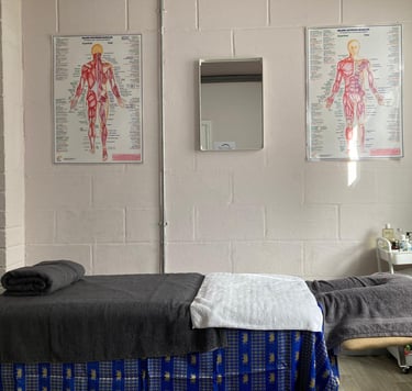 a room with a bed and a chair