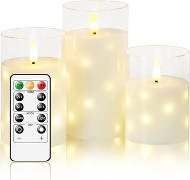 a group of candles with remote control