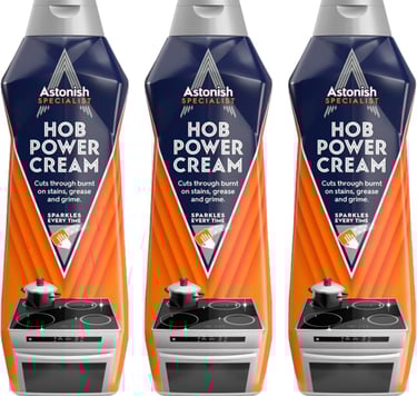 a group of three bottles of hot saucer cream