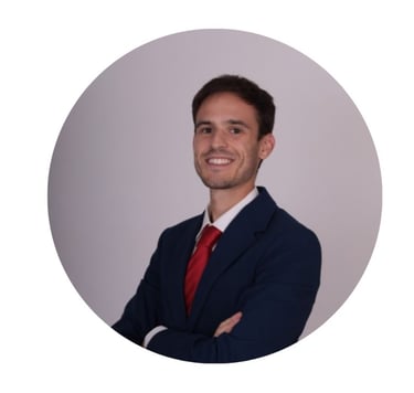 a man in a suit and tie smiling