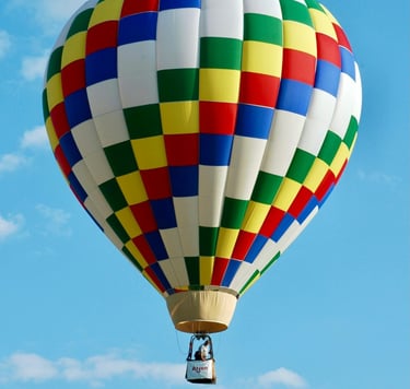 a colorful hot air balloon in the sky