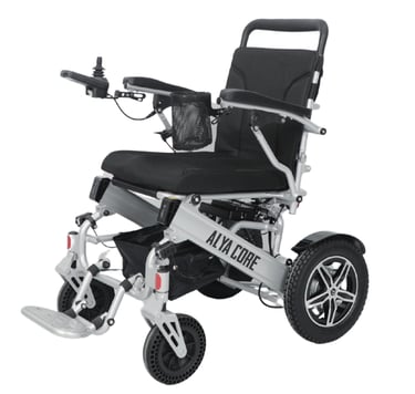 All-terrain electric wheelchair with wide rear tires and joystick