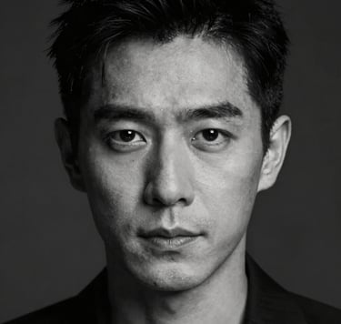 A striking, high-contrast close-up portrait of a professional actor in a moody, cinematic lighting setup. Deep shadows in #0F0F0F contrast with sharp, off-white #F5F5F5 highlights on facial features. The composition is tight and minimalist, emphasizing intense expression and dramatic atmosphere.