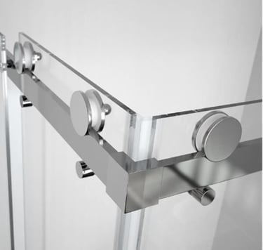 Close up of metal shower door rollers and track used in Auckland shower repairs