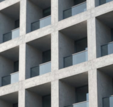 Close-up detail of a modern building facade featuring brutalist concrete textures and sharp geometric shadows. The lighting is soft morning sun, with a color palette of #CDDDE0 and #6E8898. High-end architectural photography style.