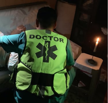 a doctor in mongolia providing care by candlelight