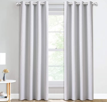 a curtain with a curtain in a room