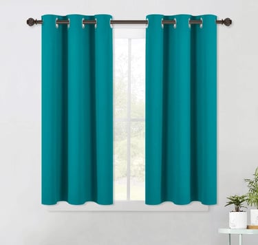 a curtain with a curtain in the middle of a room