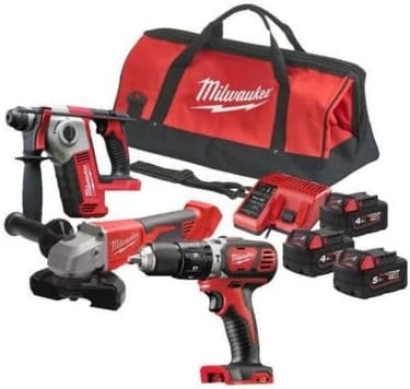 Milwaukee cordless power tool combo kit including rotary hammer, grinder, drill, batteries, and bag.