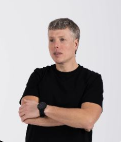 a man in a black shirt and a watch on a white background