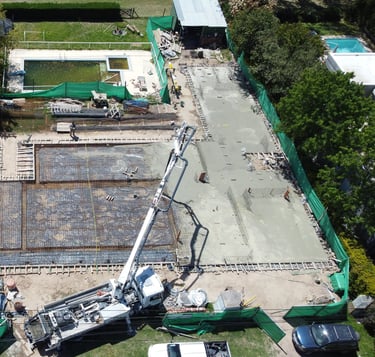 a crane is working on a construction site