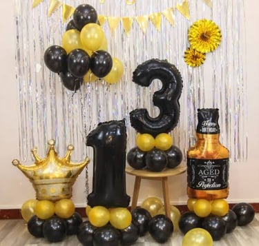 a birthday party with balloons and balloons