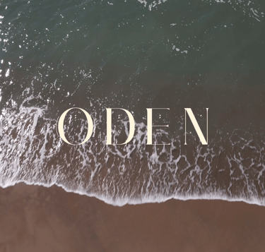 a beach picture with sand and sea