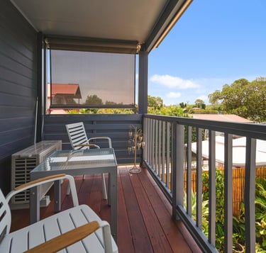 A peaceful balcony space perfect for morning coffee or quiet evening relaxation.