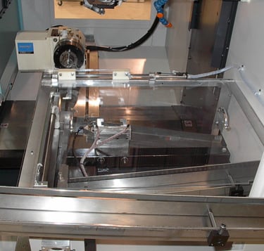Robot loading cell for high volume small parts