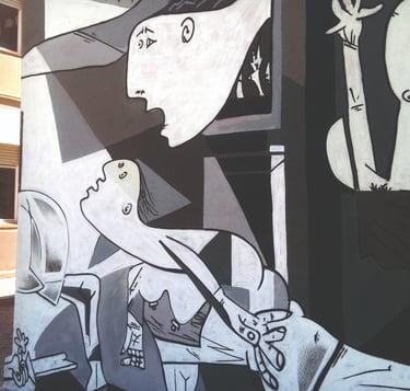 graffiti pintura mural decorativa spray guernica escuela