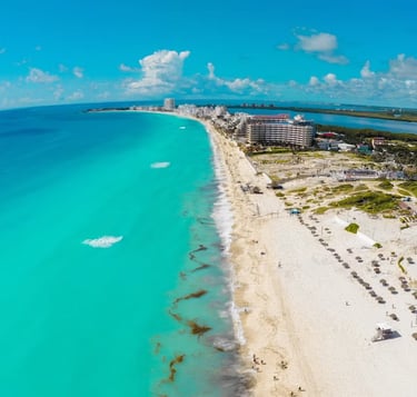 a beach with a view of the ocean and a beach