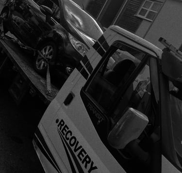 alt="Recovery truck loading vehicle in Droitwich – gallery image"
