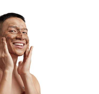 young male using cafines all natural face scrub