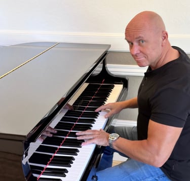 Mark Bulmer Performing On Piano