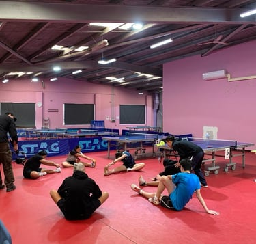 Members stretching before practise