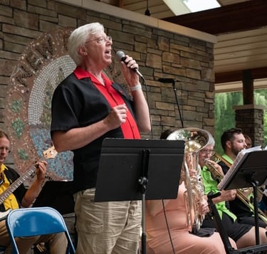 Rob Riley singing 2024