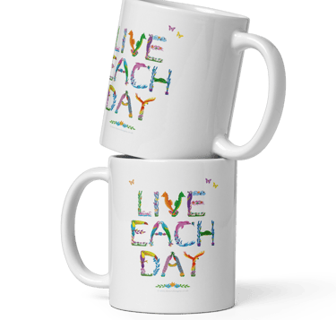 Ceramic mugs with Live Each Day printed on both sides in tropical exotic wordart