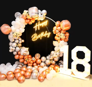 a birthday cake with balloons and balloons