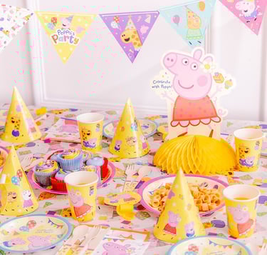 a table with a pep pep the pig party hat